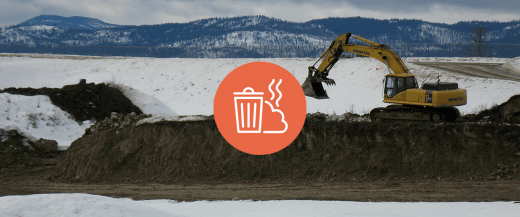 Heavy machinery operating at Flathead Electric Cooperative Landfill