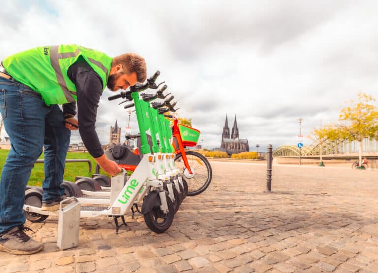 Lime scooters being charged with renewable energy.