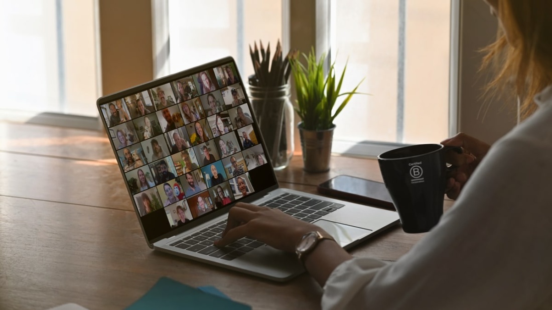 remote worker on video call b corp mug